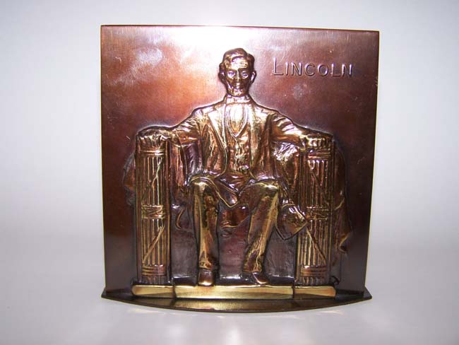 A pair of 'Lincoln in the chair' base relief bronzed bookends circa 1960 — image 2
